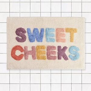 UO Home sweet cheeks bath mat rug rainbow pastel decor colorful urban outfitters